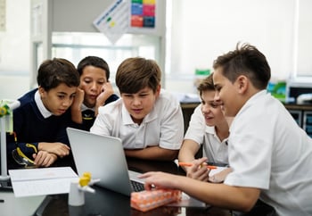 students learning with laptop