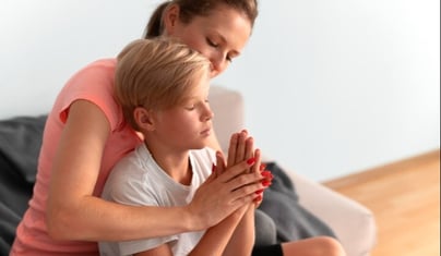 woman-praying with boy (Small)
